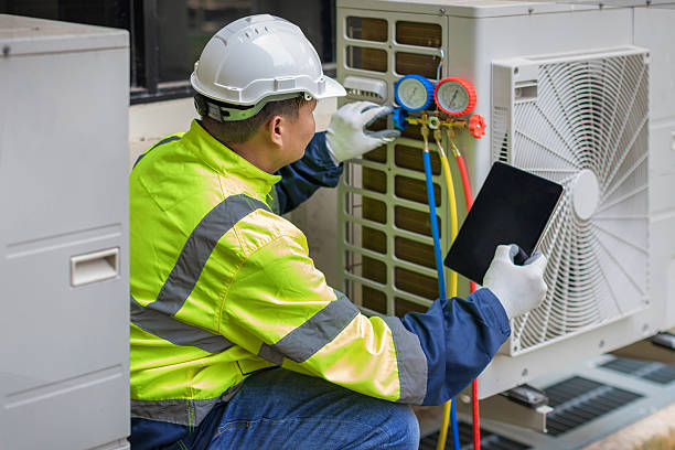 Professional Air Duct Cleaning technician working in Frederick, OK